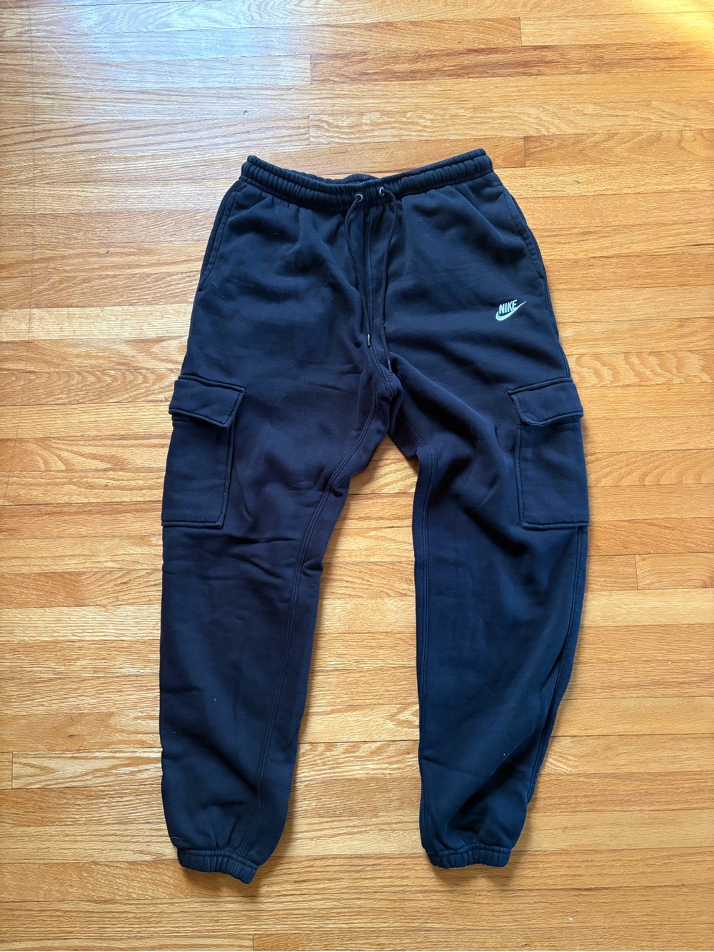 Nike Black Cargo Sweatpants with White Swoosh Logo